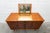 Teak dressing table/sideboard from the 1960s with four drawers (one fixed) and two doors. It is in superb condition with...