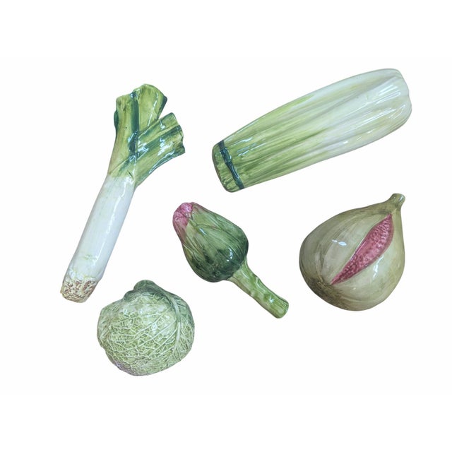 A Set of 5 Ceramic Trompe Loleil Ceramic pieces of a stalk of Celery, an Artichoke, Leeks, head of Cabbage, and a Fig I...