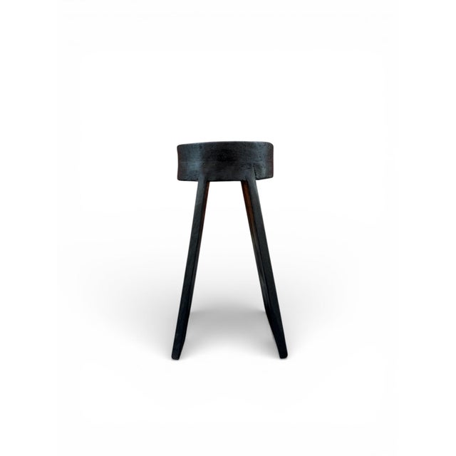 The Halo Stool is a handcrafted solid wood piece designed around balance, weight, and negative space. A thick circular...