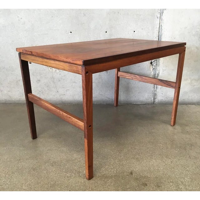 Vintage side table In gorgeous rosewood. The dimensions make it a great plant holder or book stand