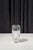 This vintage Baccarat lead crystal vase features a beautiful, fluid shape that balances heavy, thick-cut glass with soft,...