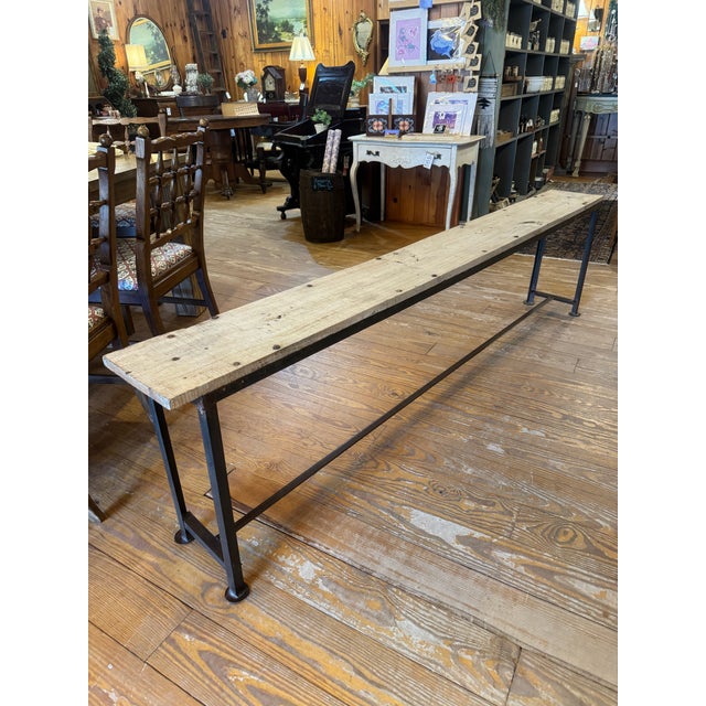 X-Long wood bench, custom made with Salvaged barnwood top and metal frame base. Lots of Natural knots in the wood. Great...