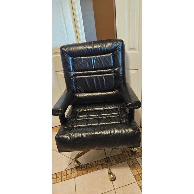 RARE John Widdicomb Leather Desk Chair. Brass Metal Legs. Has roller wheels. Black leather. This is meant to go with the...