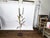 A large French metal cattail sculpture from the mid 20th century, with square base. Created in France during the...