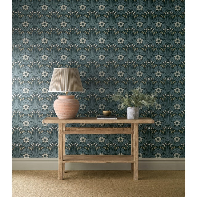 Woodbell & Anemone features a figure-of-eight shape creating a simple ogee pattern. The document was originally a small...