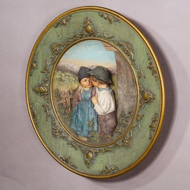 Terracotta Wall Plate with Lovely Children in Traditional Costumes by Johann Maresch A large terracotta wall plate...