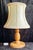 Vintage Table Lamp with Turned Teak Wood Base and Hand-Stitched Leather Shade, 1970s, in Very Good conditions. Designed...