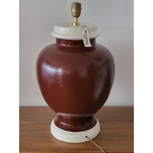 Discover the large Hubert Olivier ceramic lamp, an exceptional piece that will enhance your interior. with its vintage...