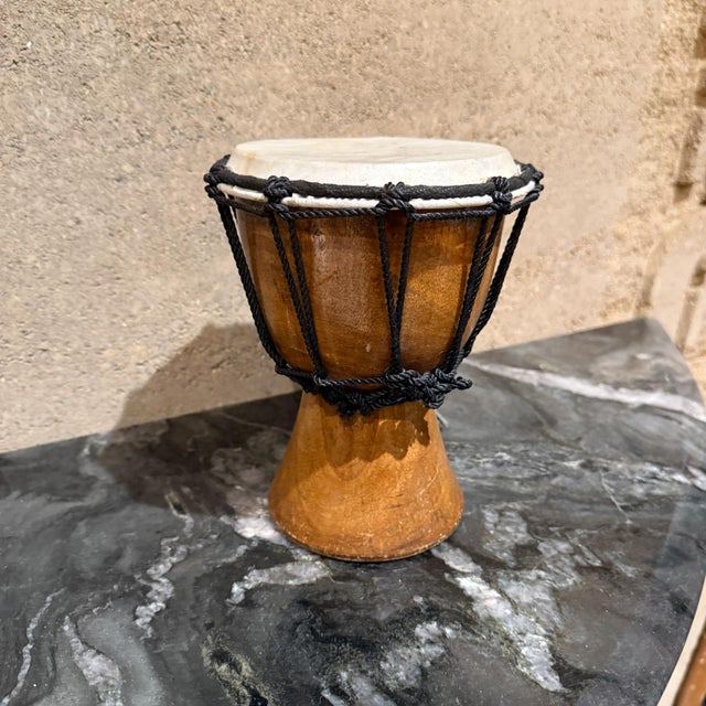 For your consideration, a djembe drum, a rope-tuned, skin-covered goblet drum originally from West Africa. It is...