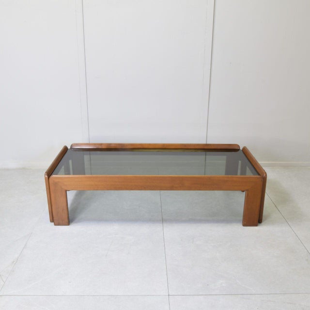 Rectangular coffee table by Afra & Tobia Scarpa for Cassina. The structure is entirely made of solid walnut, with...