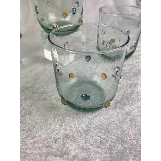 An extraordinary find for the discerning host, this grand set of eleven (11) double old fashioned glasses is a masterclass...