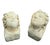 This is a remarkable, highly sought-after pair of carved sandstone heads, likely sourced as architectural salvage from an...