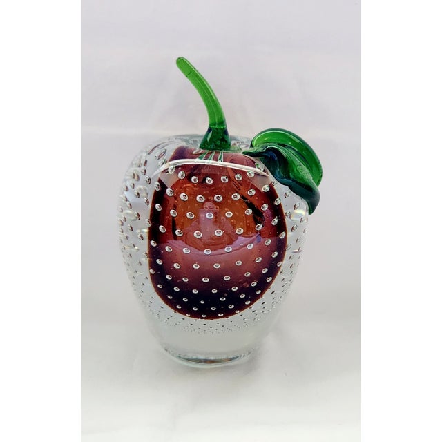Add a touch of timeless elegance to your décor with this **Murano Style Controlled Bubble Art Glass Apple Paperweight**....