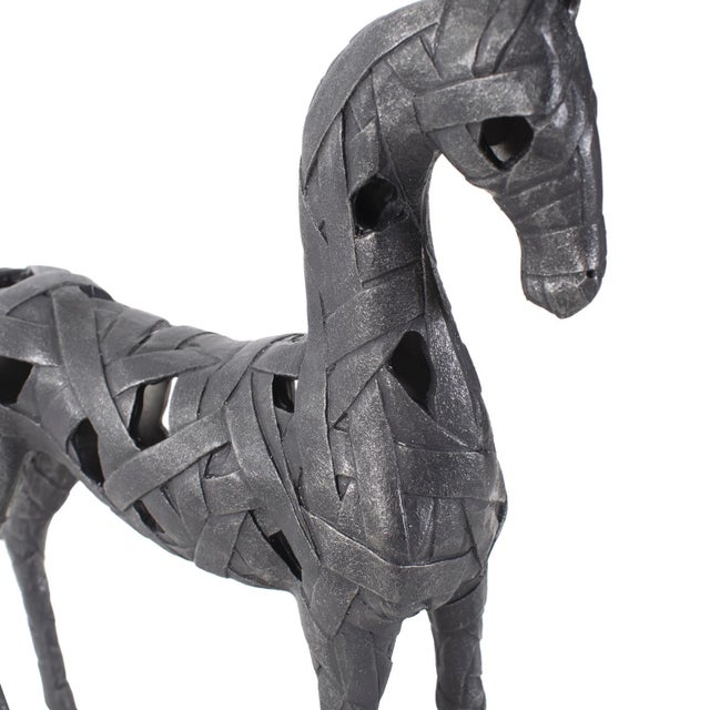 Handmade molds, meticulously crafted by skilled artisans, bring this sculpture to life with exquisite detail. With its...