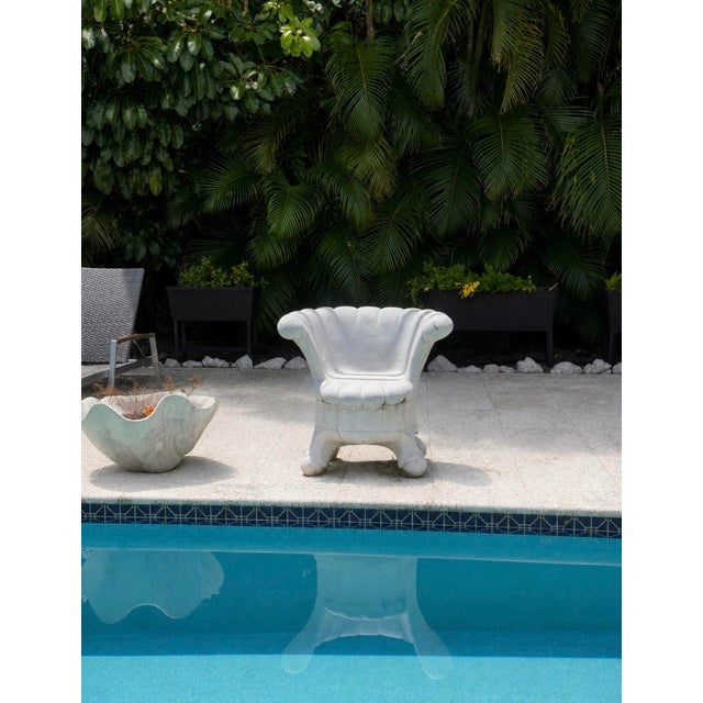 Fantastic vintage cement shell chair with tons of character and an amazing aged surface. This piece has a beautiful...