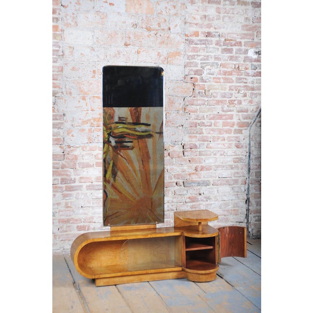 This architecturally magnificent and visually captivating vanity table (dressing table) in the distinct Art Deco style...