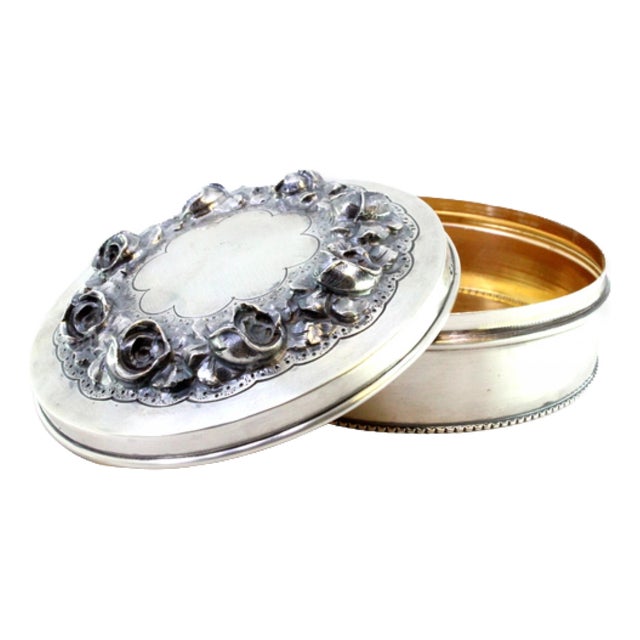 Silver Box with Raised Floral Motifs and Frieze For Sale