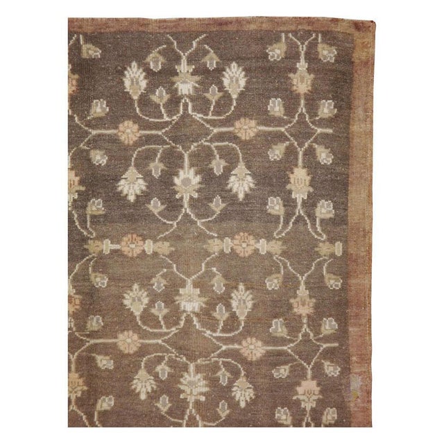 A vintage Turkish Anatolian brown accent rug handmade during the mid-20th century. Measures: 5' 5" x 8' 9".