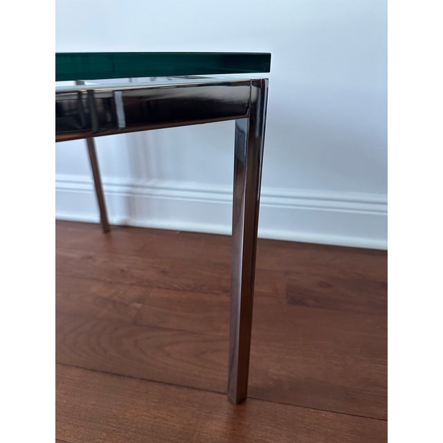 Pair of authentic Knoll Studio Florence Knoll side tables in chrome and glass. This is the smaller size 24x24 that appears...