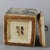 This charming square ceramic box is a delightful decorative accent that brings a touch of traditional folk art to your...