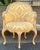 This is a pair of Italian carved and cerused pine French Louis XV style barrel tub chairs. The damask upholstery feels...