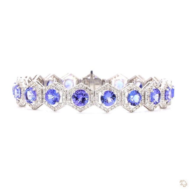This bracelet from our contemporary estate collection centers on tanzanite accents totaling 10.88 carats for rich,...