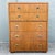 A handsome vintage highboy dresser from Drexel’s Passages collection, featuring a warm walnut finish and Campaign-inspired...