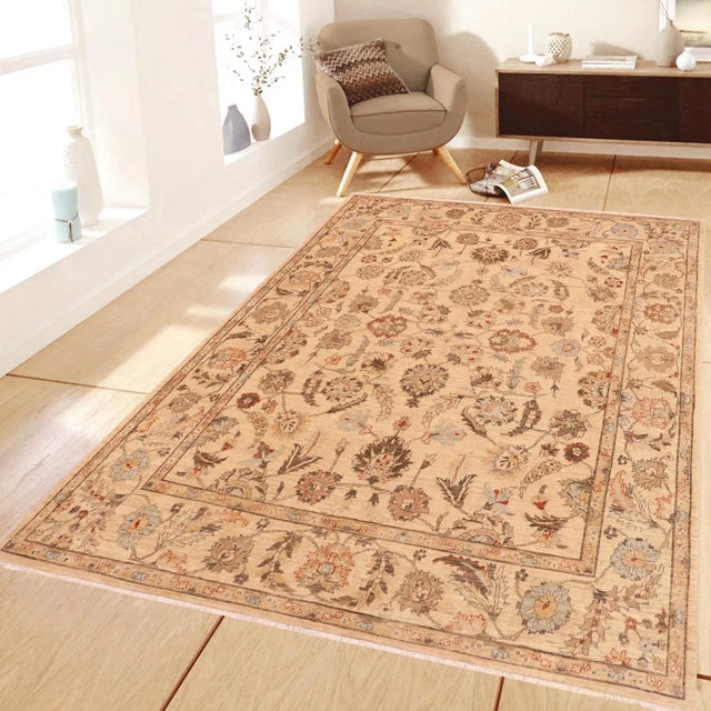 "Enhance the ambiance of your home with this magnificent Persian-influenced Turkish hand-knotted rug made by skilled...