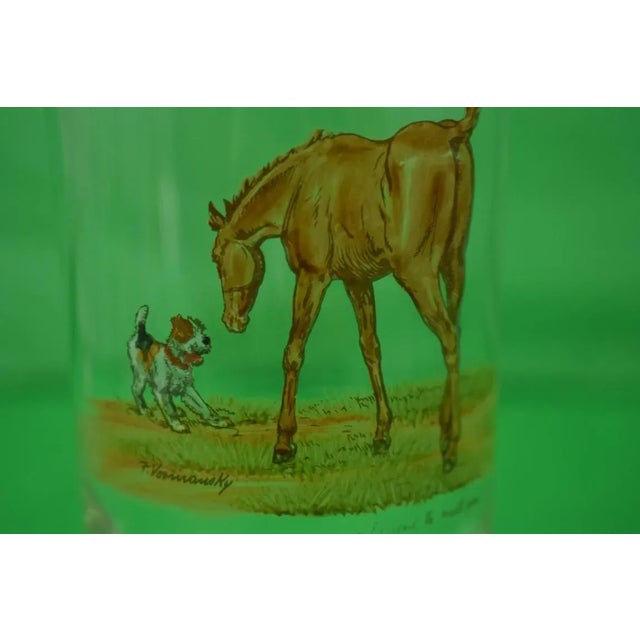 This is a set of 10 high-ball glasses by Frank Vosmansky. The pieces date back to the 1950s.