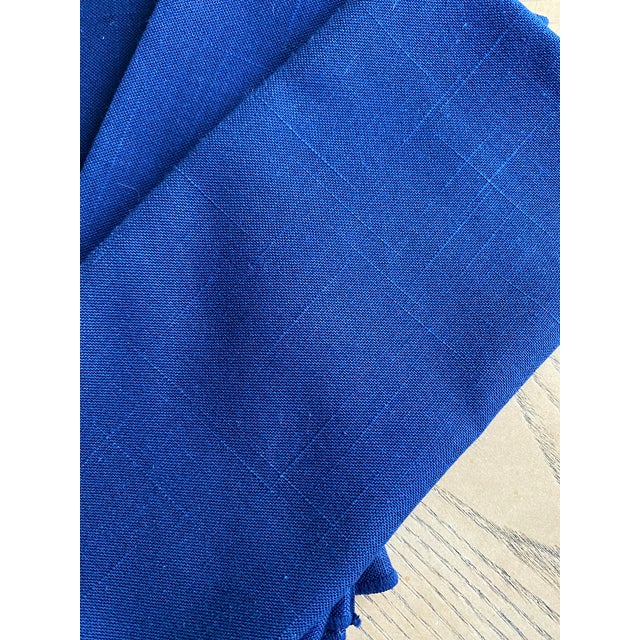 Set of four rich sapphire-blue linen dinner napkins. Unfolded, each is a generous 18.5" square. Not only are these crisp...