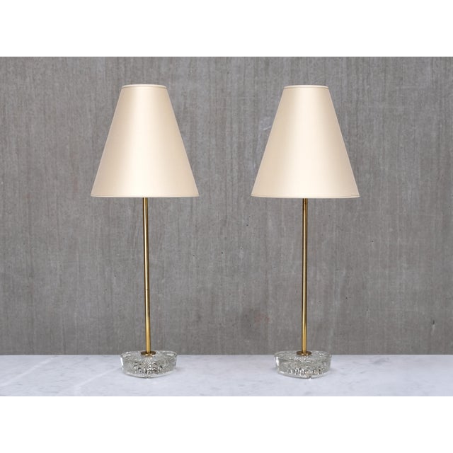 This rare pair of table lamps was produced by eae (elektrofabriks aktiebolaget eskilstuna) in sweden in the 1950s.the...