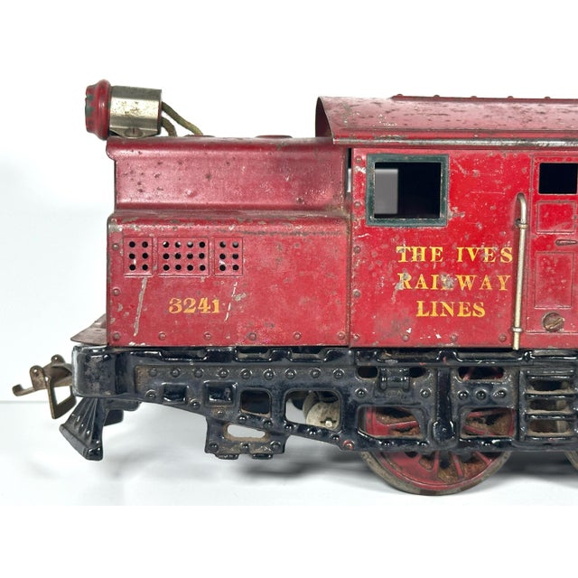Rare & Original Ives Wide Gauge 3241 Electric Locomotive for your consideration. The toy locomotive measures approx. 14...