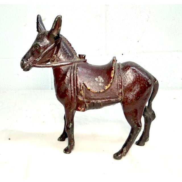 Up for sale is an antique 1920's AC Williams hand-painted cast iron donkey still bank. This collectible bank is unique and...