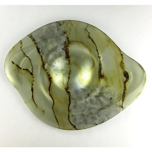 Shades of Yellow, gold, and platinum opaque hand formed glass makes this dish a very unique piece indeed. In perfect gift...