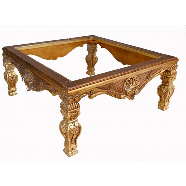 Wonderful French Empire style gilt coffee table Good size to this Large glass top stands on the intricately carved based...