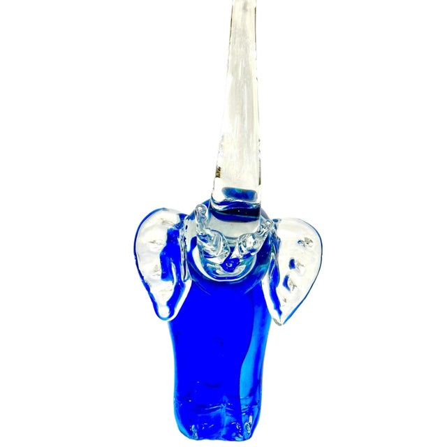 Vintage Cobalt Blue Blown Glass Elephant Paper Weight. Solid Glass Elephant with long trunk and tail.