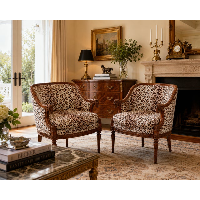 Louis XVI Style Carved Ram’s Head Armchairs in Leopard Upholstery- A pair Dimensions Height: 32 1/2 in. (82.5 cm) Width:...