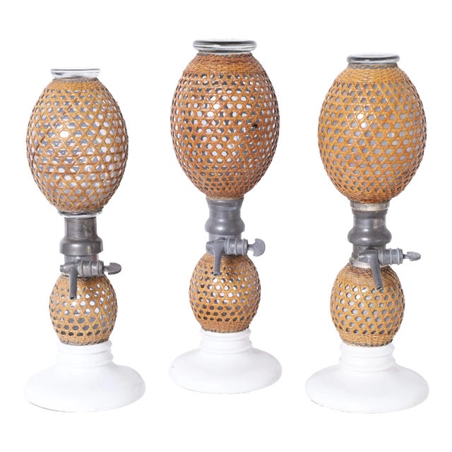 Set of Three Vintage French Caned Seltzer Bottles For Sale