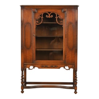 Antique Berkey & Gay Style English Jacobean Carved Walnut and Burl Wood Bookcase or Bar Cabinet, Circa 1920s For Sale