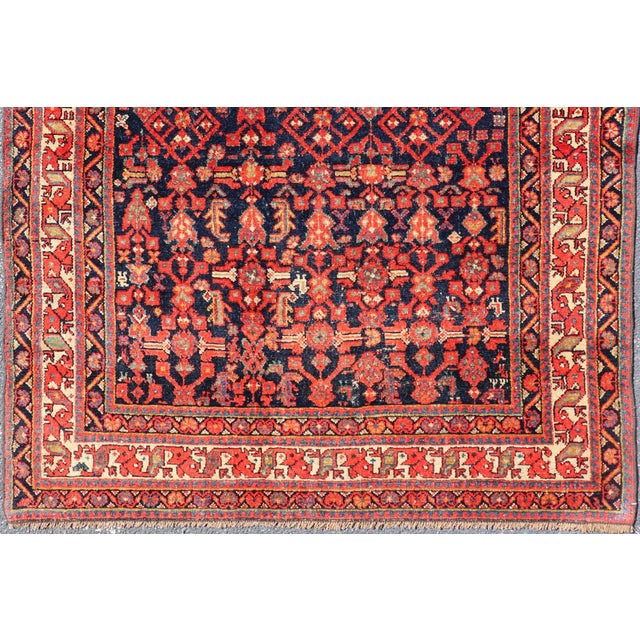Measures: 4'9 x 6'5 Antique Kurdish Rug With Navy Blue Field, Red Tribal Motifs and Ivory Border 4'9 X 6'5. Keivan Woven...