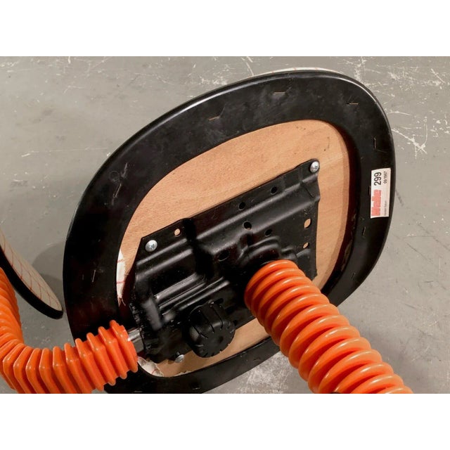 A spectacular adjustable, telescopic and wheeled office chair, pop, post-modernist, memphis, red lacquered metal...