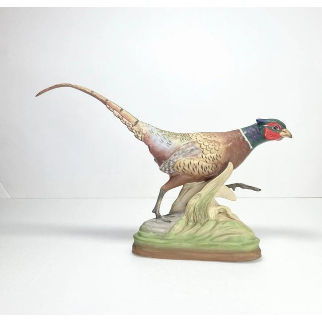 Presenting a splendid duo from Boehm, this set of two male and female ring-necked pheasant figurines stands as a testament...