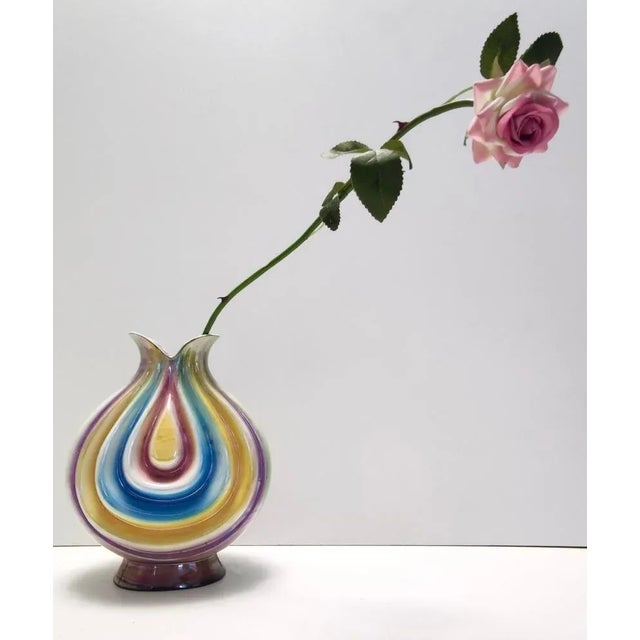 Made in Italy, Sesto Fiorentino, 1950s. It is made in lacquered ceramic with iridescent colors. This vase is a vintage...