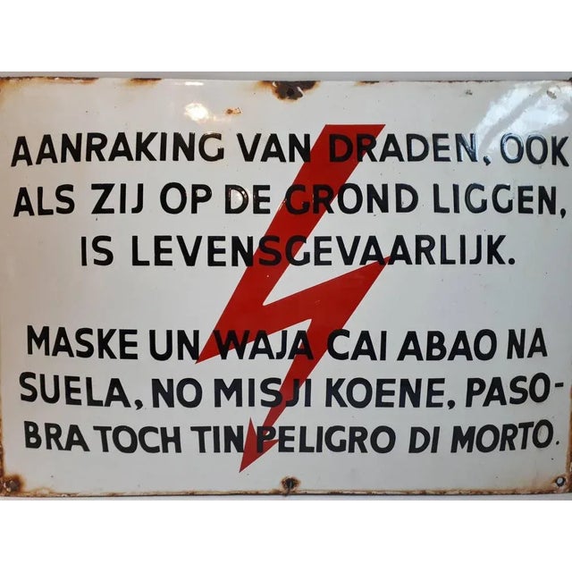 An orignal enamel sign that was used as a warning for the people on one the ABC Islands. Papiamentu (or Papiamento) is a...