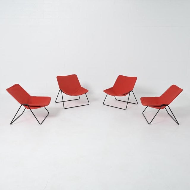 This set of G1 chairs is designed by French designer Pierre Guariche and produced by Airborne in 1953. The chair features...