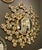 Original retail $2400, stylish global Views Modern Gold Aquarius Wall Mirror, showroom floor sample