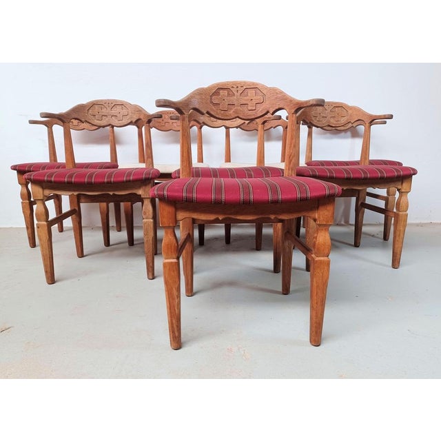 Set of 8 original Danish 1970s Brutalist Viking chairs by Henning Kjærnulf for EG Møbler. The chairs are in solid...