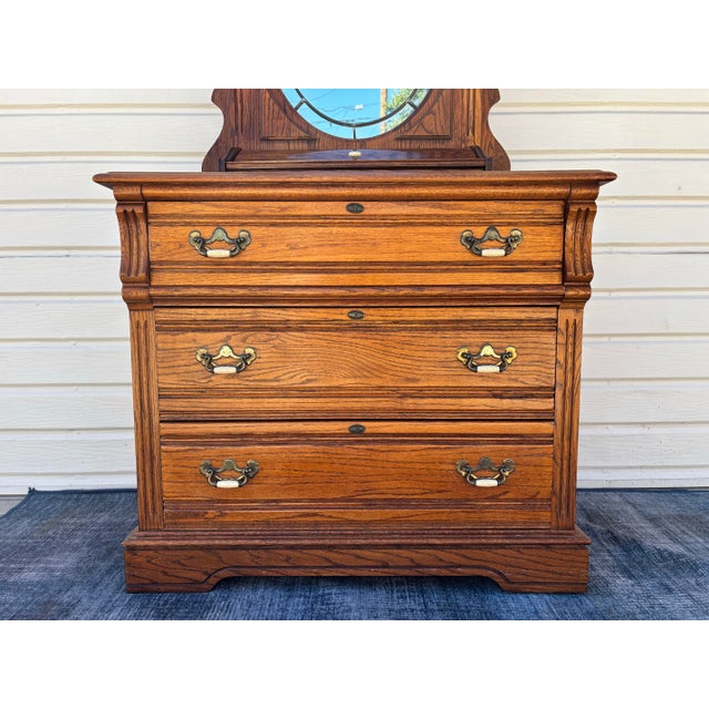 DIXIE FURNITURE Recollections Rustic Country French Solid Oak Chest with Oval Table Mirror. Total H: 76 inches Table top...