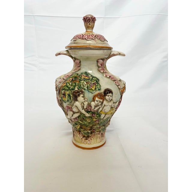 Bring old-world Italian charm to your décor with this exceptional vintage Capodimonte jar. This highly detailed piece...