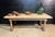 An English Oak Farmhouse Dining Table dating to the early 1900s. Having a carved freeze rail right round and sitting on 4...